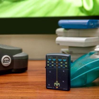 Lifestyle image of Pixel Game Design Windproof Lighter standing on a table with a nintendo 64 controller 